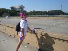 Taking a moment to stretch while crossing the Key Bridge