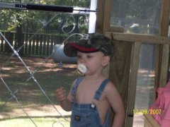 little benjamin playing on the new screend porch.