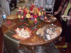 left-poached pears with brie in filo purses, right-chicken salad, cucumber, pimento cheese and roast beef w/cheddar tea sandwiches.