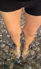 at beach 7-2010 From this perspective my legs appear thinner then they really are.