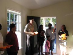 To the left of the door is me.  When I first saw this picture I did not realize that was me.  In this pic it is about 50lbs. gone.