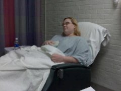 Passed out, dreaming happily.