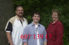 Michele, my husband, and oldest son. 6 months post op.