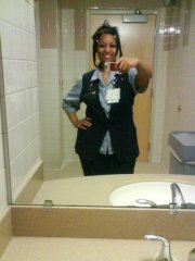Me at work trying to be cute in this hideous uniform...