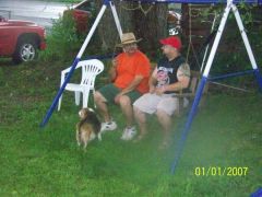 Two old men and a beagle.