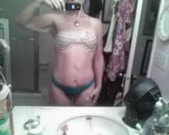 THE FRONT AGAIN...I ONLY HAD A PANNICULECTOMY AND MINI TUCK...THAT IS THE BELLY BUTTON I WAS BORN WITH..IT IS LOWER THEN IT USE TO B AND MY BATTLE MARKS FROM MY 10 POUND 8 OUNCE SON...IF I'M NOT MISTAKEN A FULL TUMMY TUCK GETS RID OF STRETCH MARKS