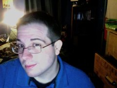 With glasses.