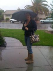 If you have to go in the rain...at least look cute :)  this is the first time I have ever worn my boots over my jeans...what do you thinK?