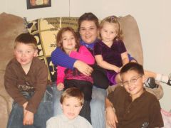Trying to hide under kids. Thanksgiving 2008