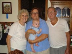 My mom, dad and sister with Baby Jude