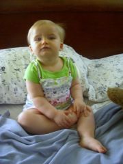 Miss C. contemplating her toes