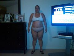 217.2 lbs size 16 lose, size 14 tight but can get into it.  Large in blouse.