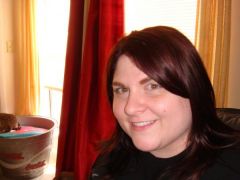 this pic was taken on 3/20/2010 (2 months before my surgery) I was about 340ish in this pic...I'm even wearing the same shirt in my other pic.  
112 pounds down!!!  
Thank You Jesus!