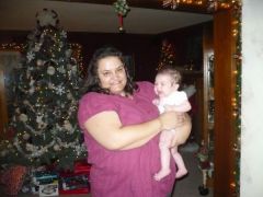Me Christmas 2009 holding my great neice.. 297lbs.