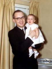 Jennifers baptism with Neal.  Daddy's little girl right from the start.