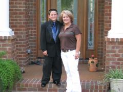 my youngest son 'Cason' and me. 1yr band ,down 65 lbs. 5/09