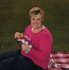 Eating a hotdog!