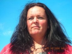 That's me on first day of a cruise with my straightened hair. I actually have natural curly hair.