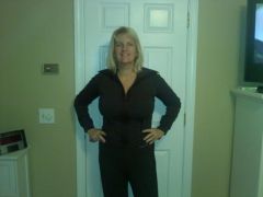 11/27/09 Holding my drains in my hands.  Feeling great 8 days post op plastic surgery.